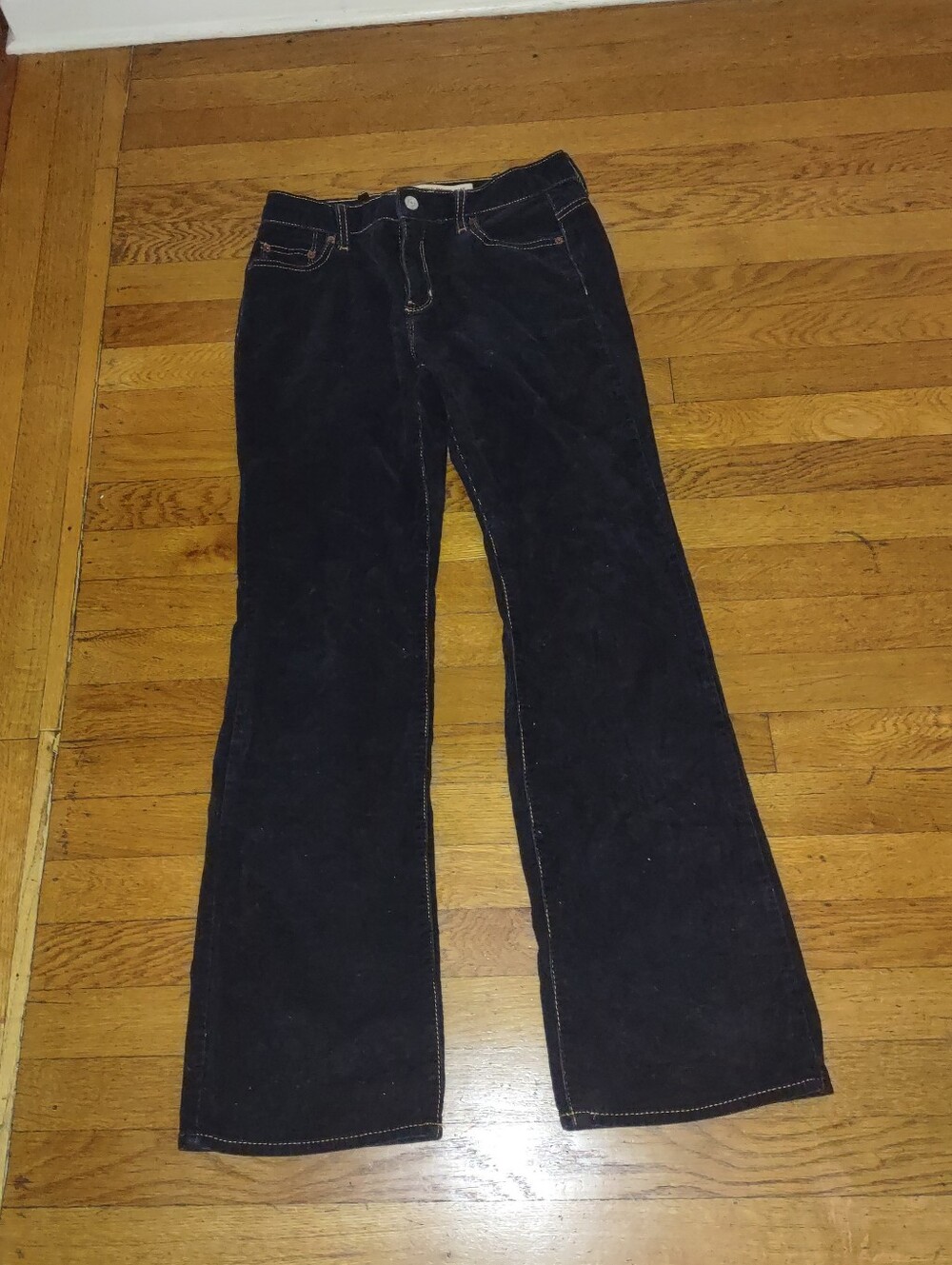 black boot cut corduroy low rise pants with yellow stitching accent from gap 6R